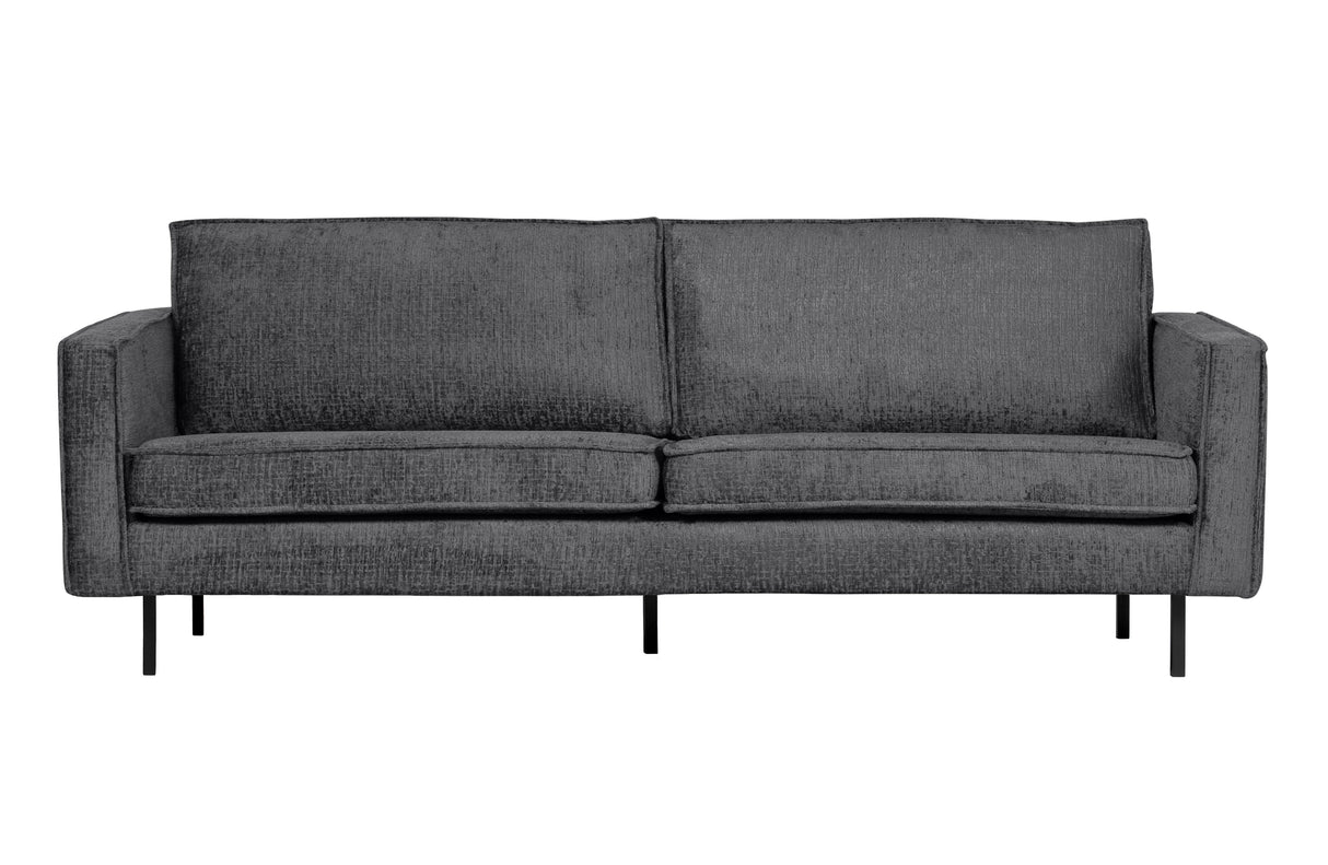 tamsiai pilka sofa