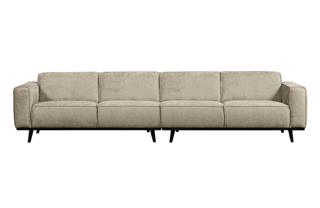 kreminės spalvos sofa