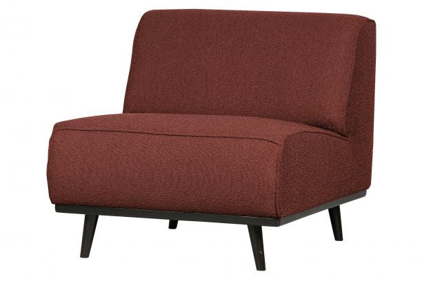 raudona vienvietė sofa